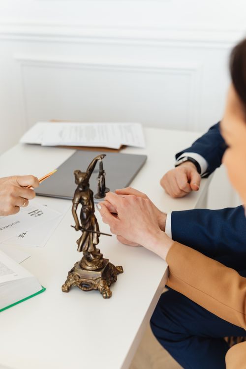 Gavel resting on a desk before a public hearing